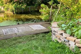 Maak een plantenbak van oude stenen: stapelen zonder metselen